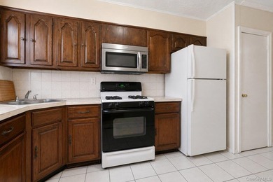 Welcome to 1074 Hart Street, a well-maintained legal two-family - photo 4