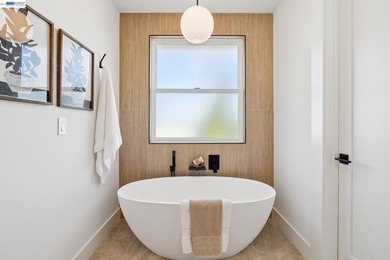 Reimagined in a modern farmhouse style, this rare Lower Elmwood - photo 32