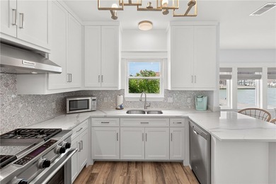 This fully renovated 4,270 sqft canal front estate in Island - photo 33