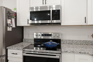 Better than new and truly move-in ready! Just over a mile from - photo 10