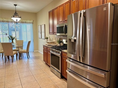Virtually Staged. VERY IMPRESSIVE HOME located on the 5th green - photo 6