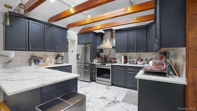 Welcome to this spacious Hi-Ranch in the heart of Bellmore - photo 6