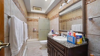 Welcome to this spacious Hi-Ranch in the heart of Bellmore - photo 10