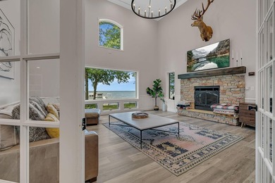 Escape to the lake's most coveted sandy shoreline with this - photo 16