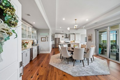Penthouse living at Tides IV with stunning top-floor views of - photo 6