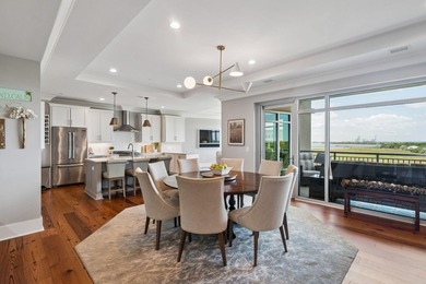 Penthouse living at Tides IV with stunning top-floor views of - photo 7