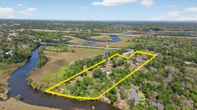 Discover the ultimate city retreat on stunning Spruce Creek - photo 3