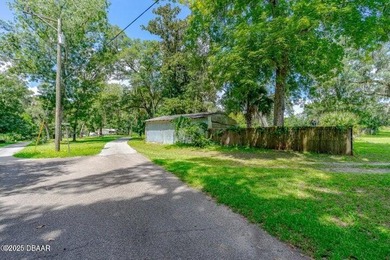 Discover the ultimate city retreat on stunning Spruce Creek - photo 8