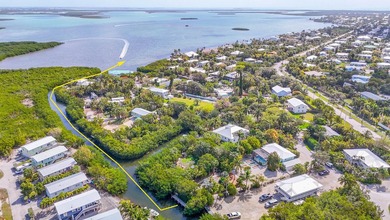 Botanical Waterfront Compound ~ 3 bedroom/2 bath elevated CBS - photo 3