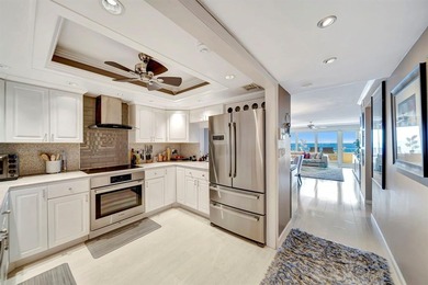 Live the coastal lifestyle in this updated 2BR/2BA corner unit