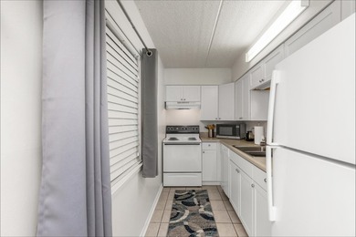 This one bedroom, one bath condo sits on the Santa Rosa Sound in - photo 11