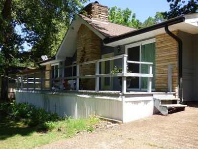Surrounded by mature trees and just minutes from Crown Lake this - photo 3
