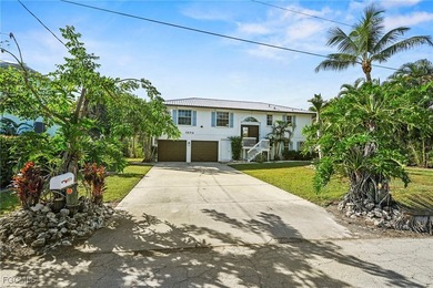 Located in the exclusive waterfront and Gulf-access community of - photo 2