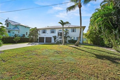 Located in the exclusive waterfront and Gulf-access community of - photo 3