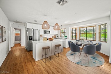 Located in the exclusive waterfront and Gulf-access community of - photo 4