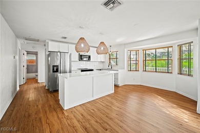 Located in the exclusive waterfront and Gulf-access community of - photo 5