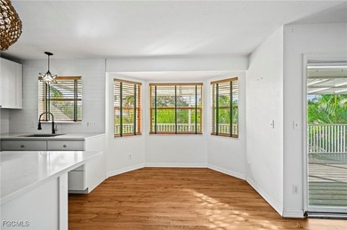 Located in the exclusive waterfront and Gulf-access community of - photo 7