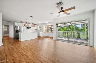 Located in the exclusive waterfront and Gulf-access community of - photo 9