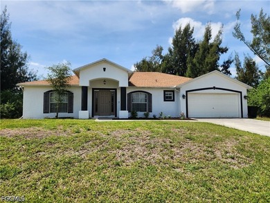 Lots of room in this home on a quiet street in NW Cape Coral - photo 1
