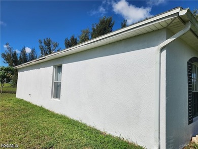 Lots of room in this home on a quiet street in NW Cape Coral - photo 2