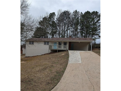 Fully renovated ranch with a daylight basement. Arrive at a