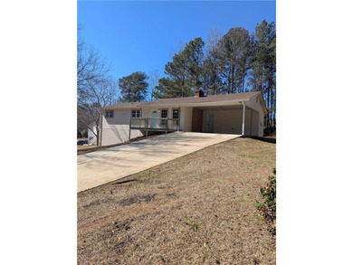 Fully renovated ranch with a daylight basement. Arrive at a