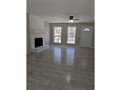 Fully renovated ranch with a daylight basement. Arrive at a