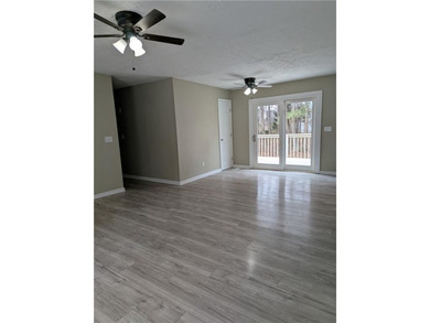 Fully renovated ranch with a daylight basement. Arrive at a