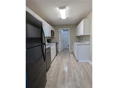 Fully renovated ranch with a daylight basement. Arrive at a