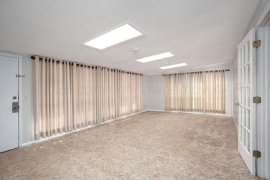 MUST SEE IN PERSON!! This unique home in Wolflin has so much