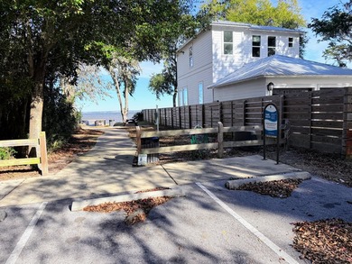 Build your dream coastal retreat on this prime vacant lot in the - photo 12