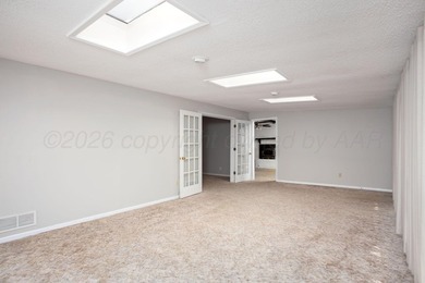 MUST SEE IN PERSON!! This unique home in Wolflin has so much