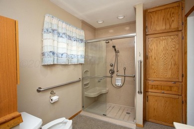 MUST SEE IN PERSON!! This unique home in Wolflin has so much