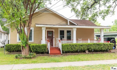 Located at 404 Filhiol Ave in West Monroe, this 3-bedroom - photo 1