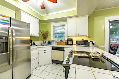 Located at 404 Filhiol Ave in West Monroe, this 3-bedroom - photo 7