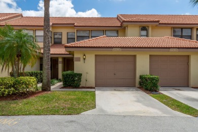 Lake Townhome/Townhouse For Sale in Wellington, Florida