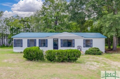 Lake Home For Sale in Portal, Georgia