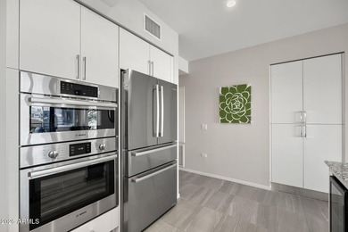 Positioned within the award-winning Optima Kierland, this - photo 27