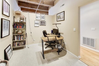 Step into this stunning brick-and-timber loft at the Premiere