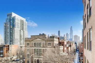 Step into this stunning brick-and-timber loft at the Premiere