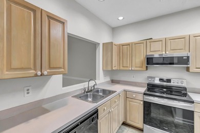 Enjoy low-maintenance living in this inviting single-story condo - photo 6