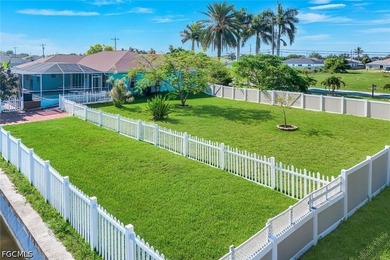 Welcome to this beautifully updated 4-bedroom, 2-bath waterfront - photo 2