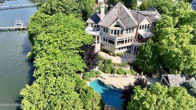 RARE OPPORTUNITY FOR A BEAUTIFUL CUSTOM RIVERFRONT HOME ON A ONE - photo 2