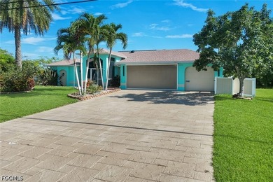 Welcome to this beautifully updated 4-bedroom, 2-bath waterfront - photo 3