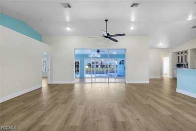 Welcome to this beautifully updated 4-bedroom, 2-bath waterfront - photo 8