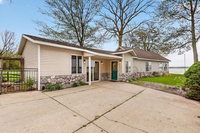 Enjoy lake living with this 3-bedroom, 2-bath ranch on Gun Lake - photo 1
