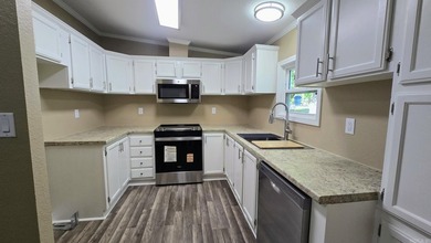 THIS IS BASICALLY A BRAND NEW HOME!! New subfloors, new - photo 8