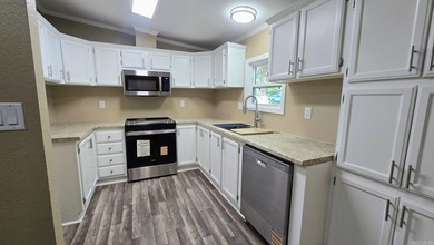 THIS IS BASICALLY A BRAND NEW HOME!! New subfloors, new - photo 9