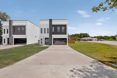 Experience modern waterfront luxury in this stunning - photo 2