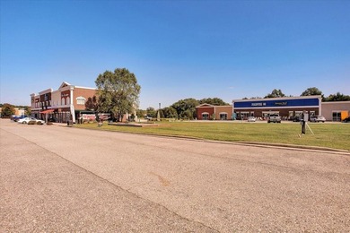 This commercial lot is located in the growing development of - photo 12